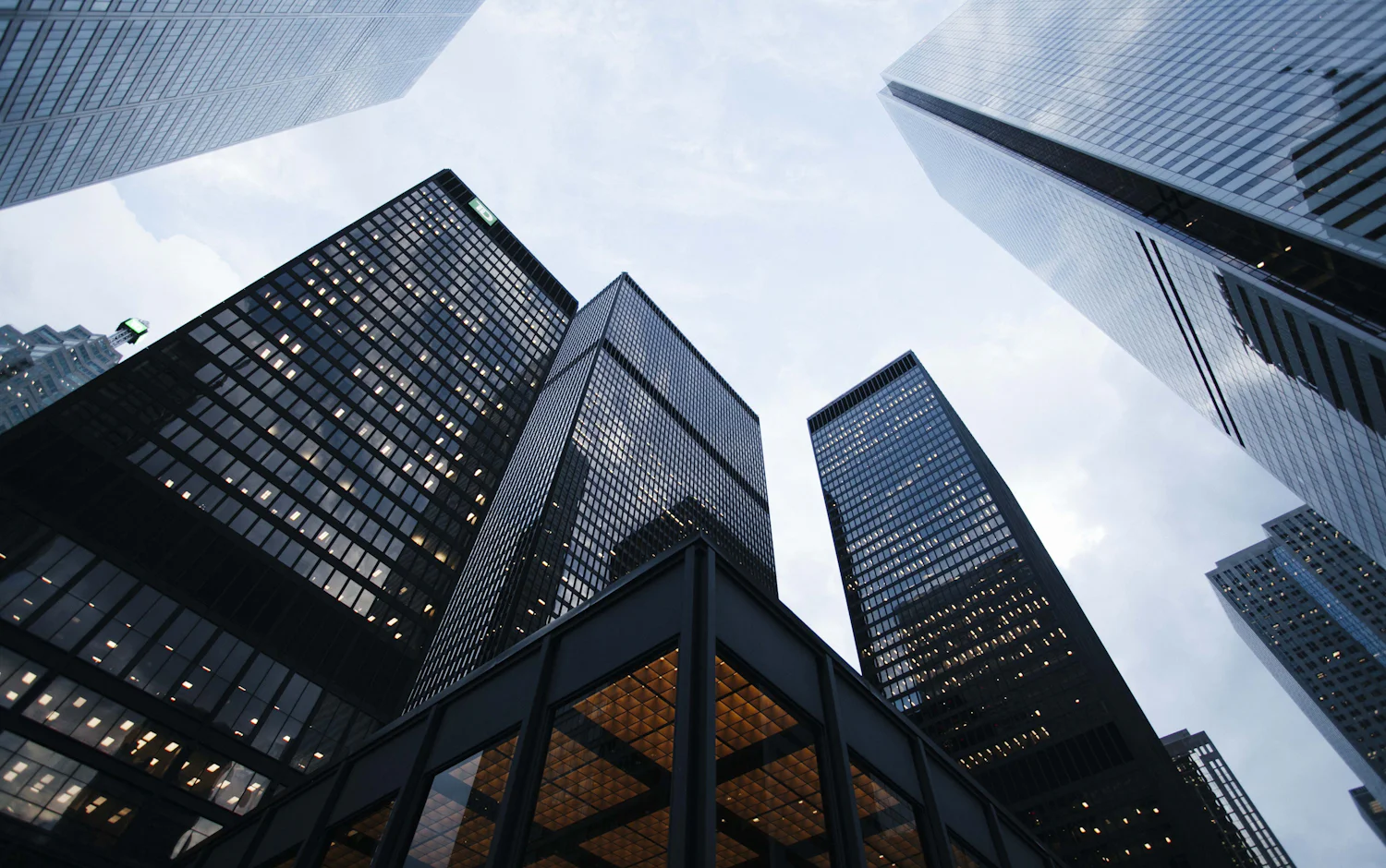 Glass office towers seen from below