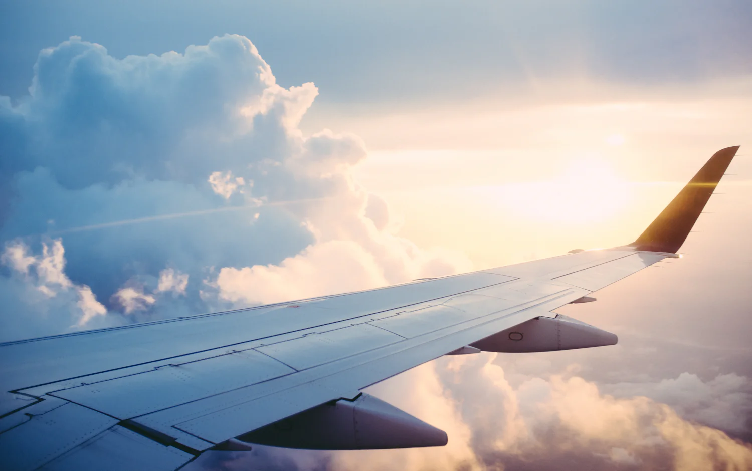 Aircraft wing above the clouds