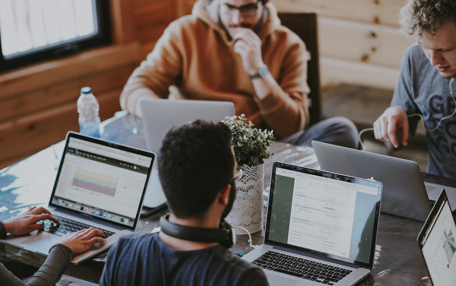 A team working together at a shared desk